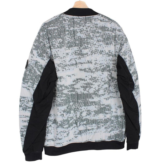Stone Island bomber jacket grey marl with embroidered compass logo and unique pattern.