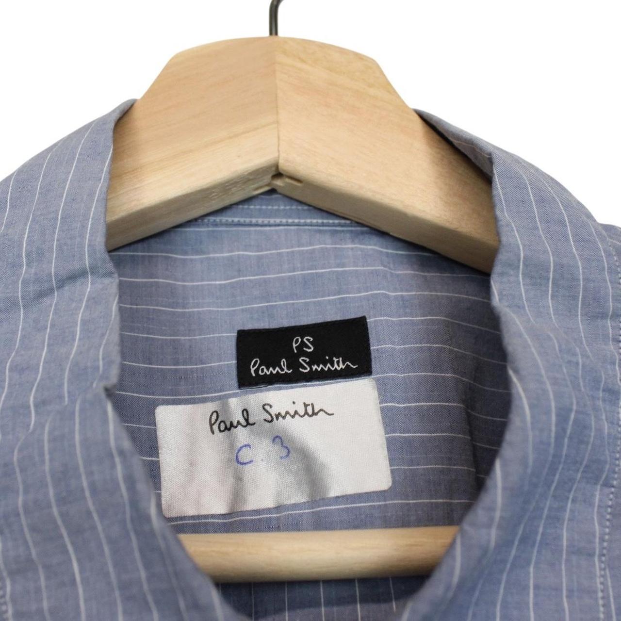 Paul Smith blue striped long sleeve cotton shirt with logo tag and fresh tags attached.