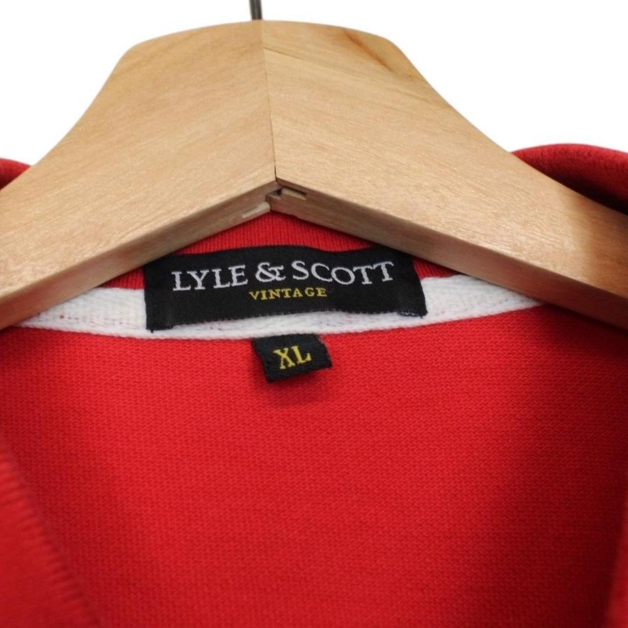 Lyle & Scott red short sleeve polo shirt with embroidered logo and cotton material.