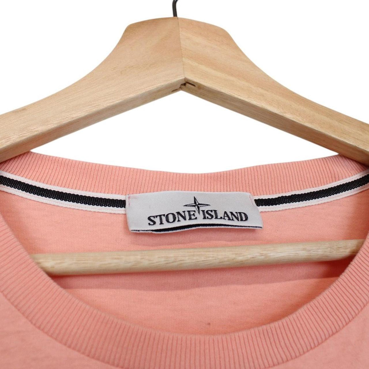 Stone Island pink short sleeve t-shirt with logo print and cotton material.