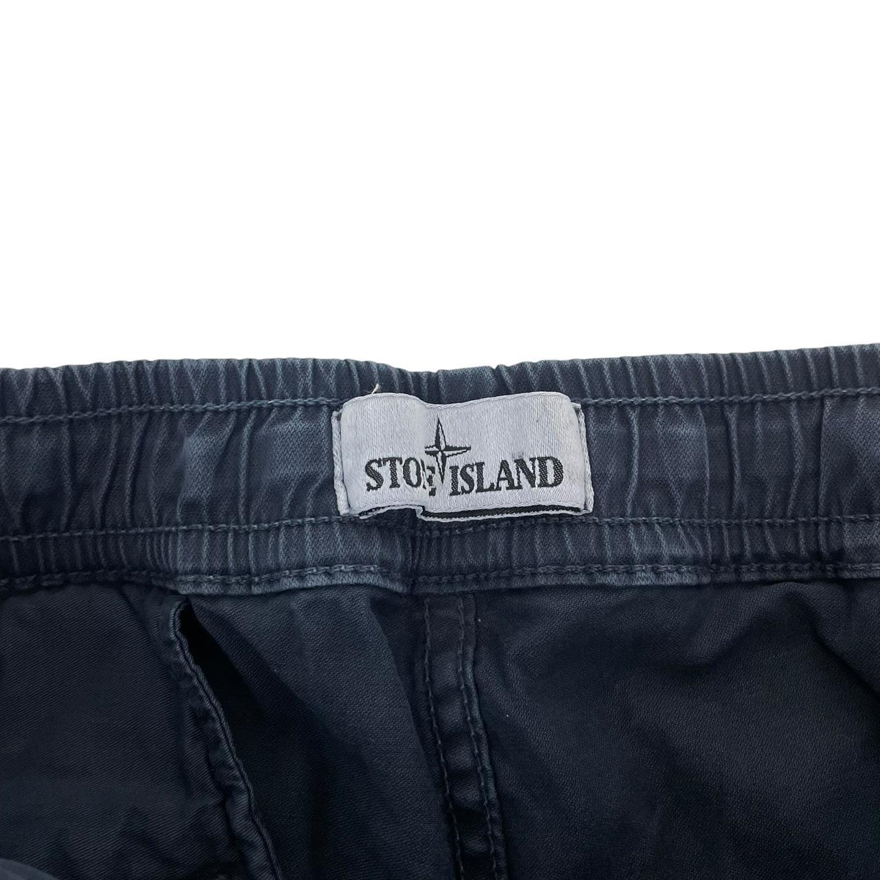 Stone Island navy blue cargo trousers with logo patch and RE-T fit design.