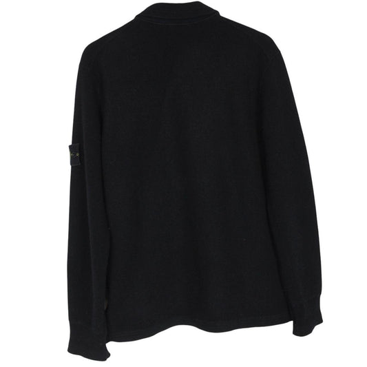 Stone Island black wool knit jumper with iconic compass logo and vintage design.