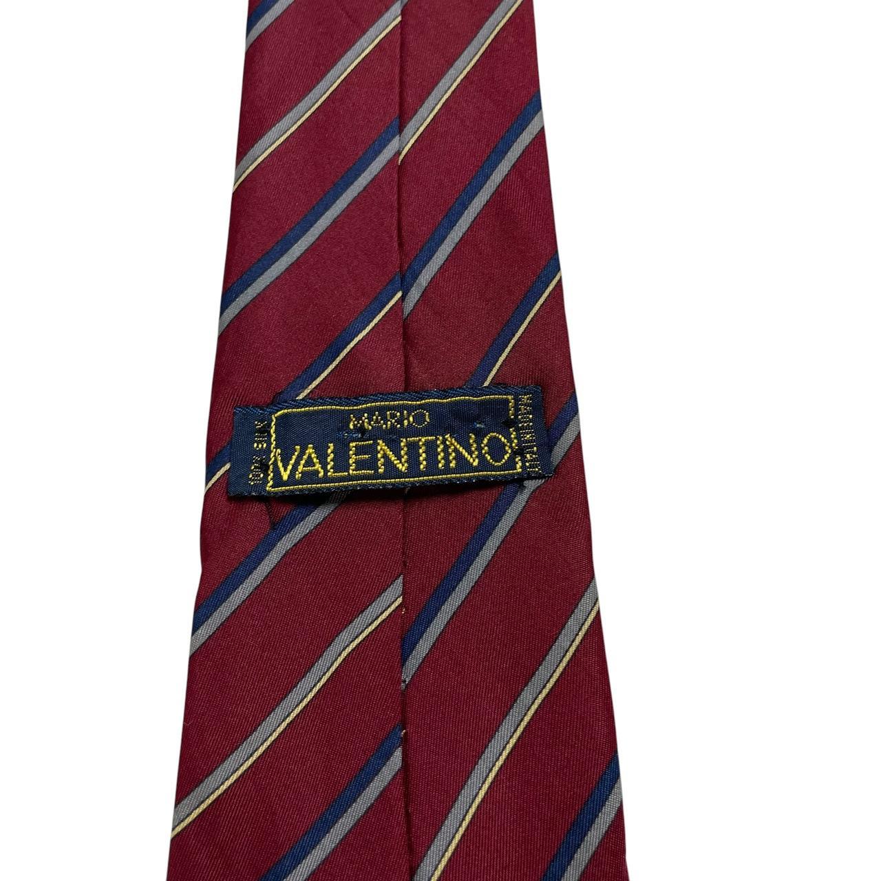 Valentino burgundy silk tie with vintage stripes and logo detail.
