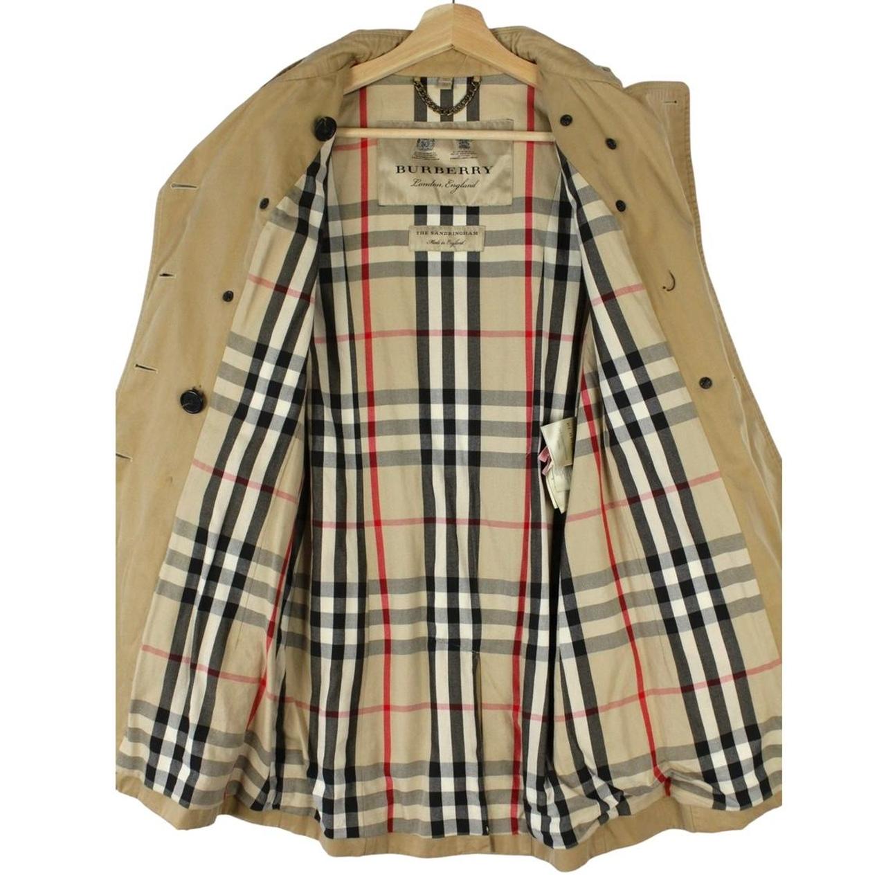 Burberry tan brown trench coat with Nova Check pattern and double-breasted design.