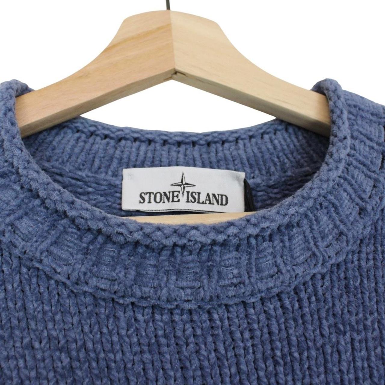 Stone Island blue jumper with degrade knit pattern and logo badge on sleeve.