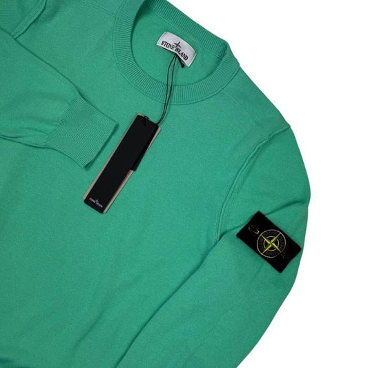 Stone Island green knit jumper made from organic cotton with logo patch detail.