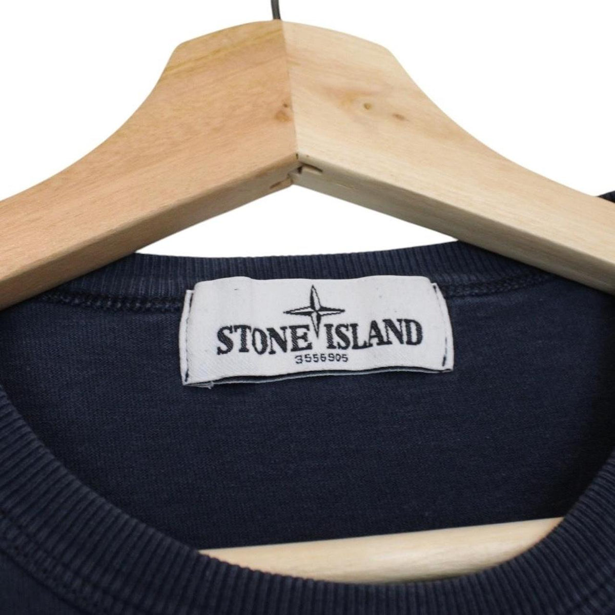 Stone Island navy blue sweatshirt with logo print and thin cotton material.