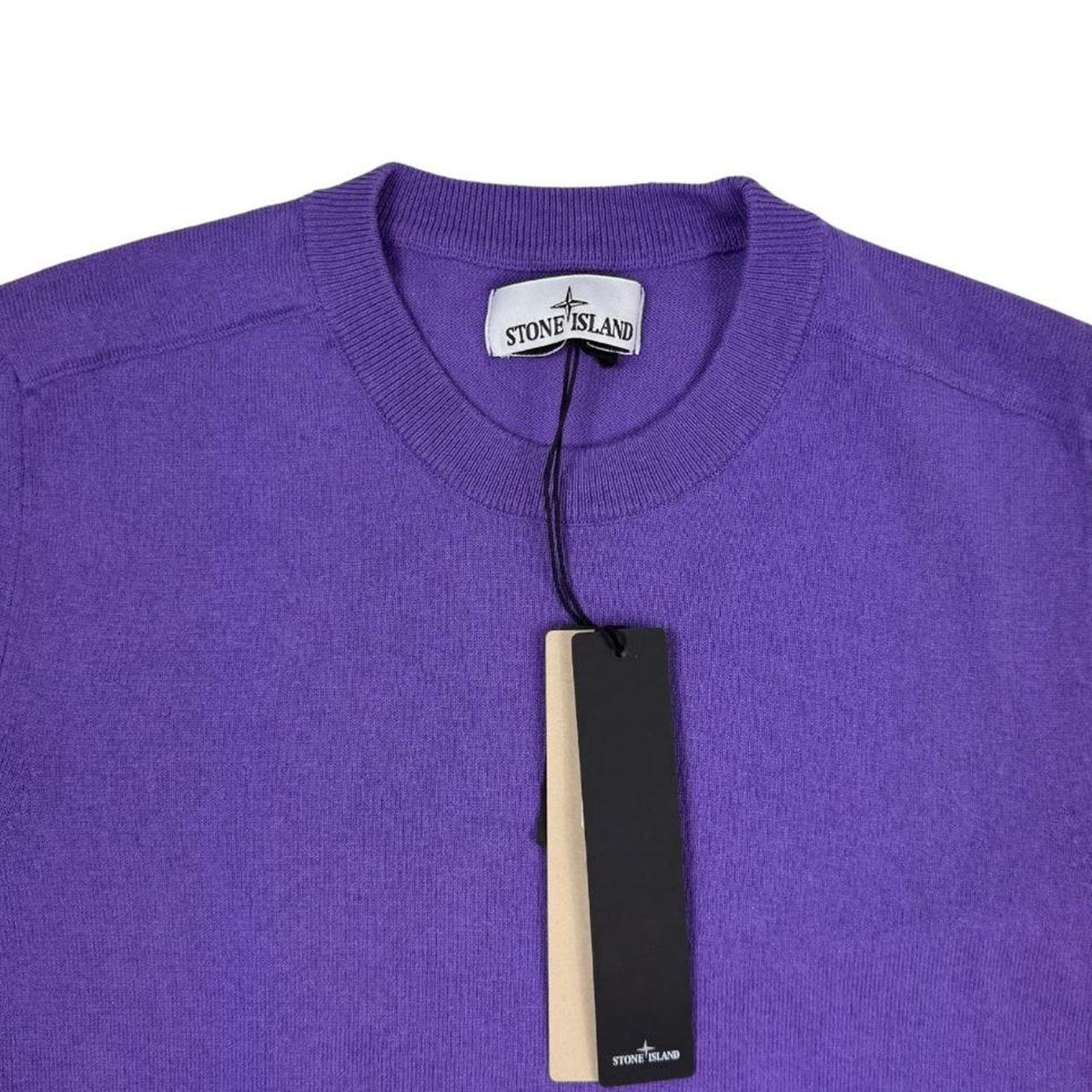 Stone Island purple knit jumper made from organic cotton with logo patch detail.