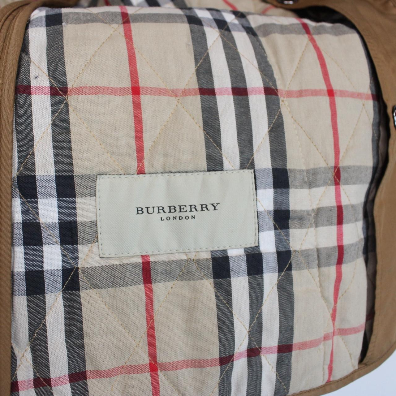 Burberry tan brown diamond quilted jacket with Nova Check lining and logo detail.
