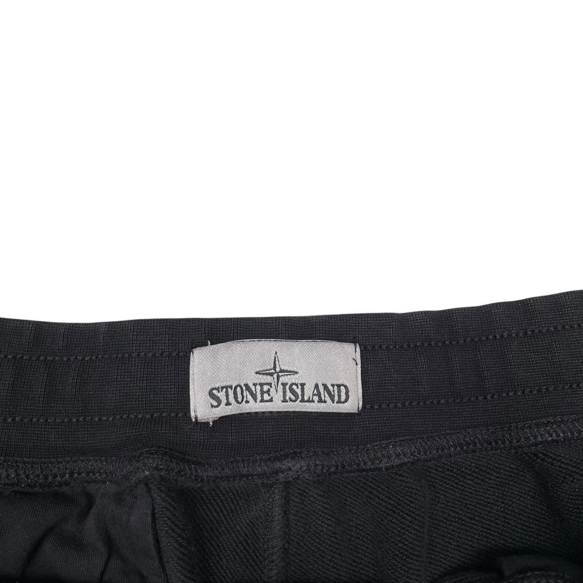 Stone Island black jogger shorts with logo patch and cotton material.