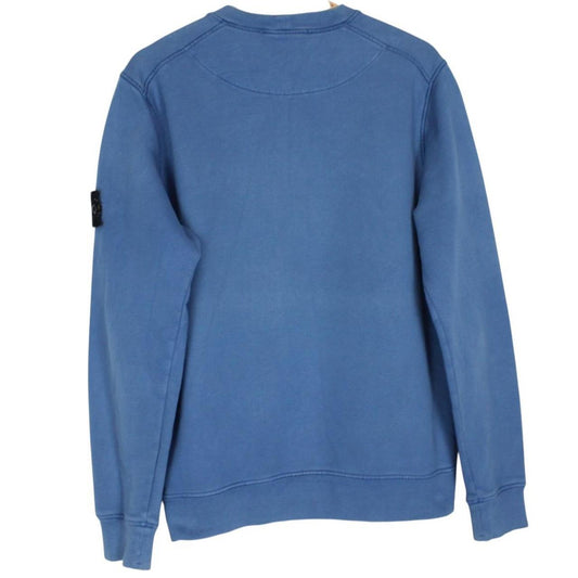Stone Island blue cotton sweatshirt with logo patch and faded details.