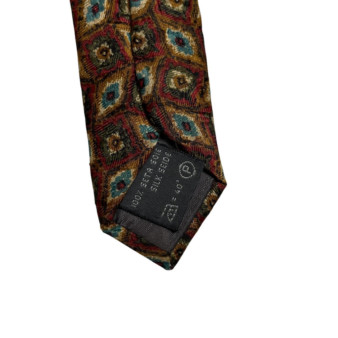 Ermenegildo Zegna multicoloured silk tie with intricate patterns and luxurious sheen.