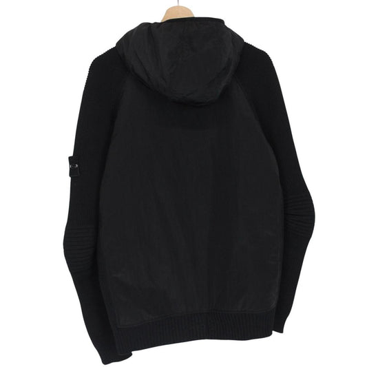 Stone Island black jacket with special process badge and full zip design.