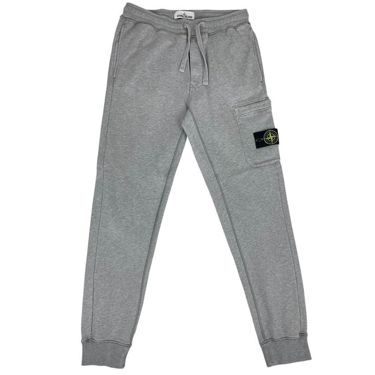 Stone Island grey joggers with logo patch and cotton material, size small.