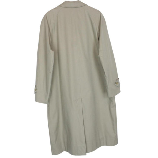 Burberry khaki green trench coat featuring Nova Check pattern and single breasted design.