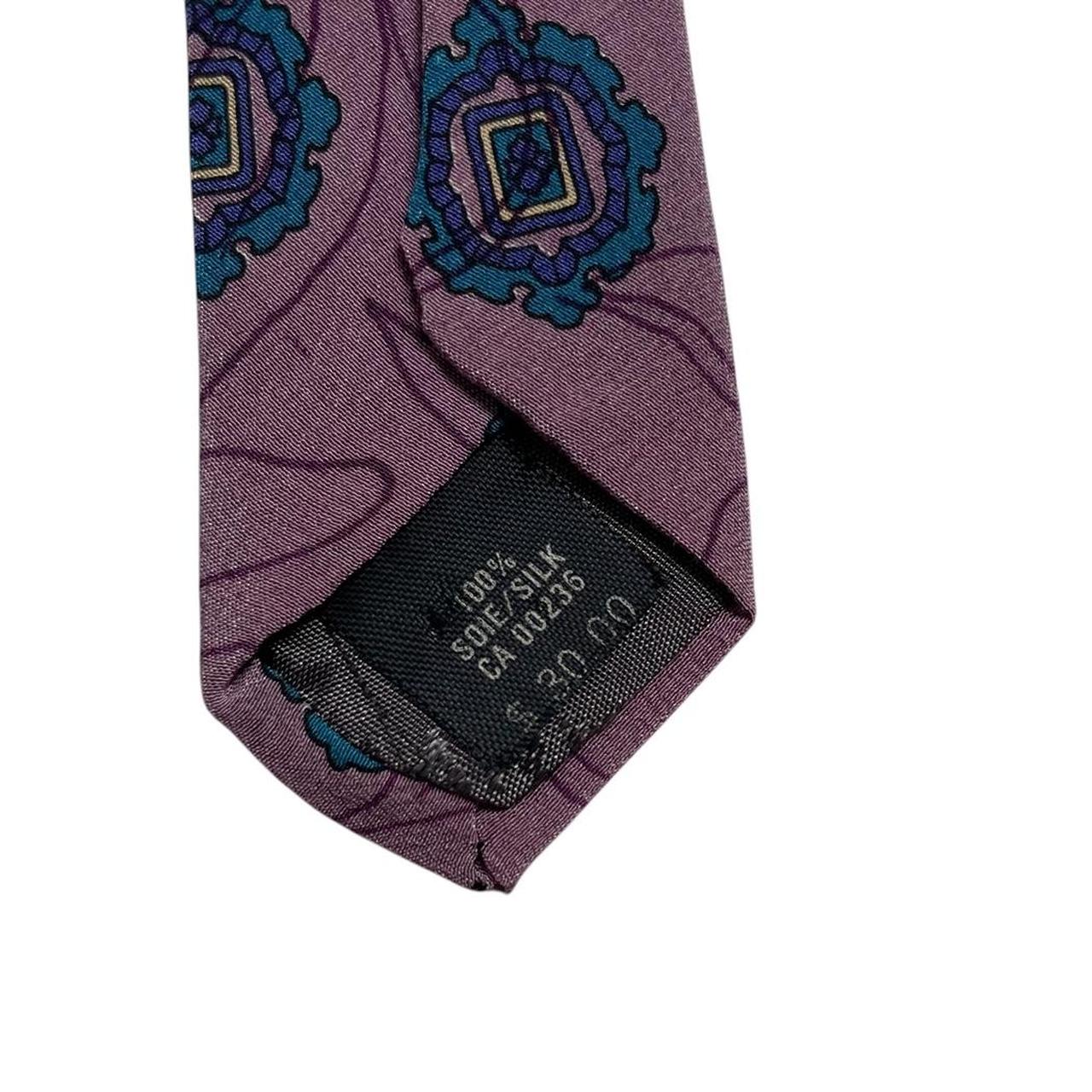 Lanvin cream silk tie with floral pattern and logo detail.