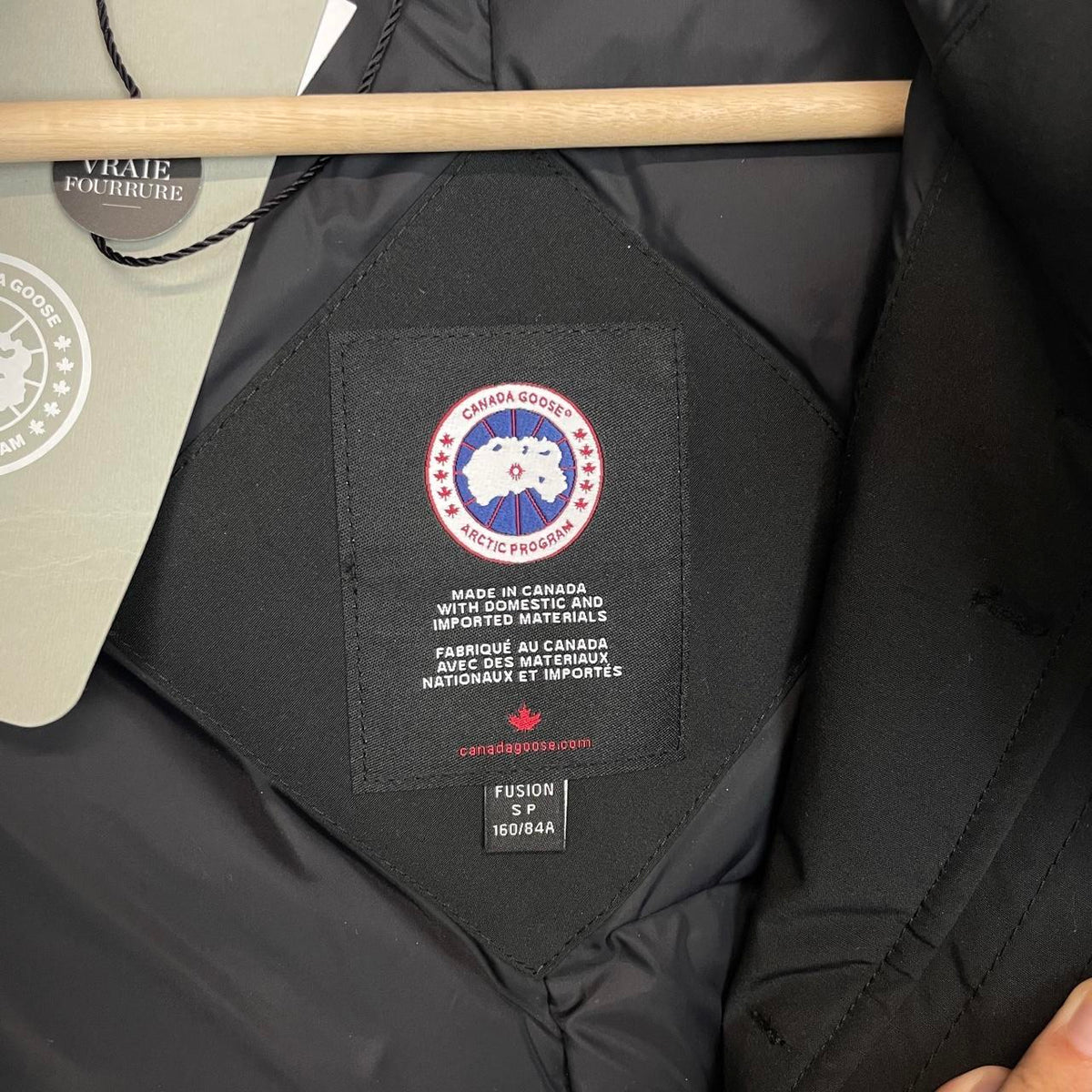 Canada Goose black parka coat with fur trim and logo patch, brand new with tags.