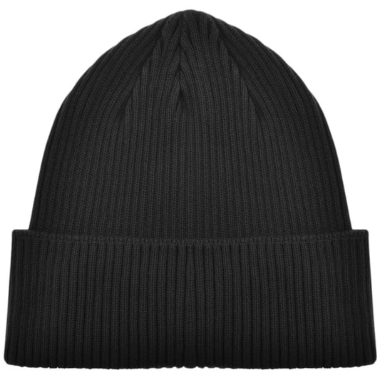 CP Company black beanie hat with goggle detail and cotton material.