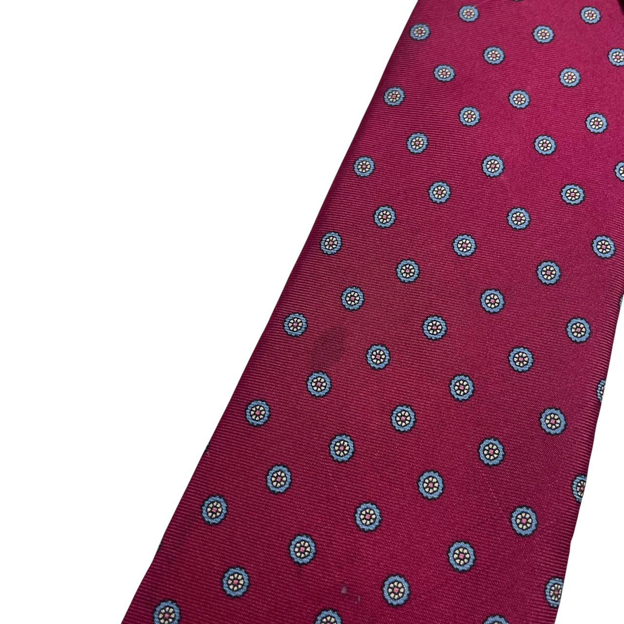 Christian Dior burgundy silk tie with subtle sheen and vintage charm.