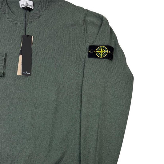 Stone Island green knit jumper made from organic cotton with logo patch detail.