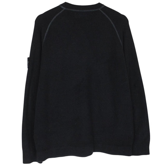 Stone Island black knit jumper with logo badge and cotton/nylon blend material.