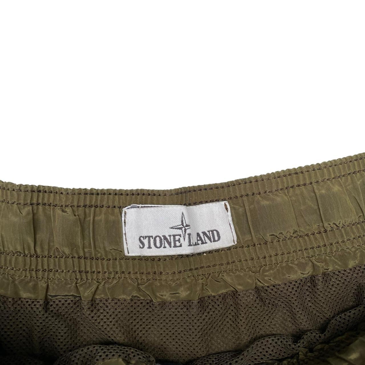 Stone Island khaki green swim shorts brushed nylon with logo patch and back pocket.