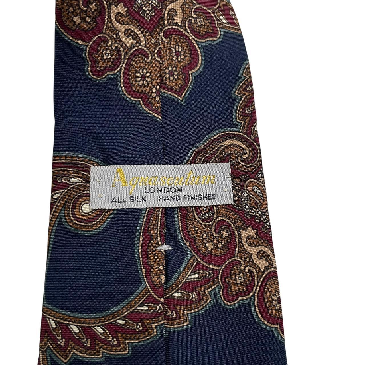 Aquascutum navy blue silk tie with vintage paisley print design.