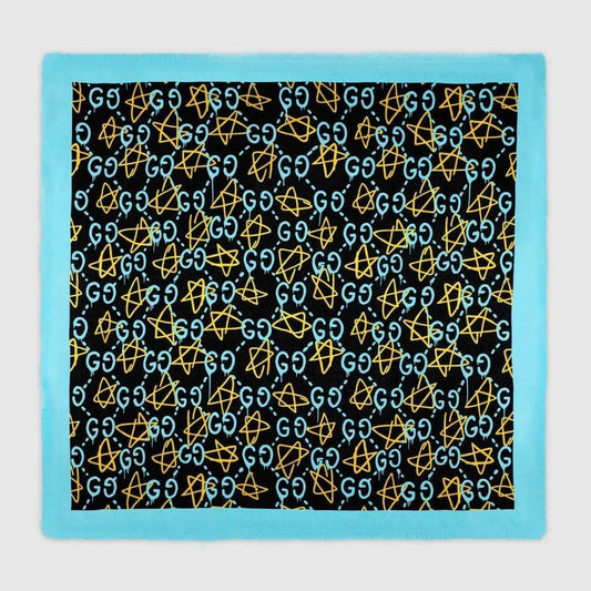 Gucci black and blue modal silk scarf with GG star pattern and logo.