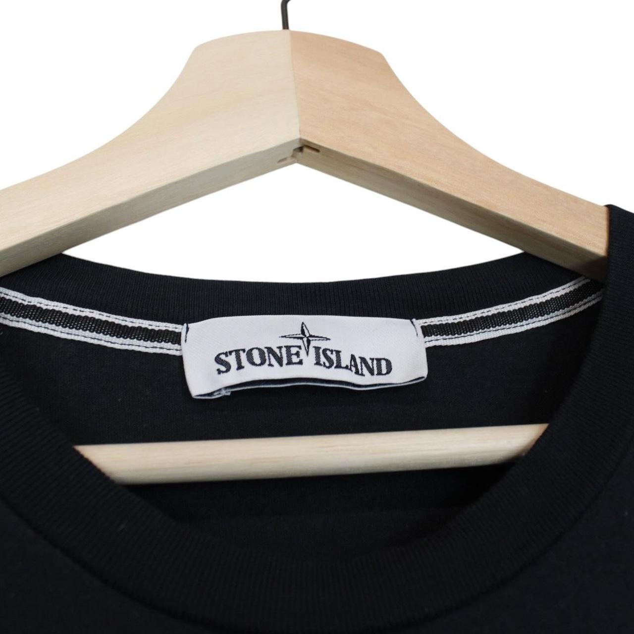 Stone Island navy blue short sleeve t-shirt with compass logo on chest pocket.