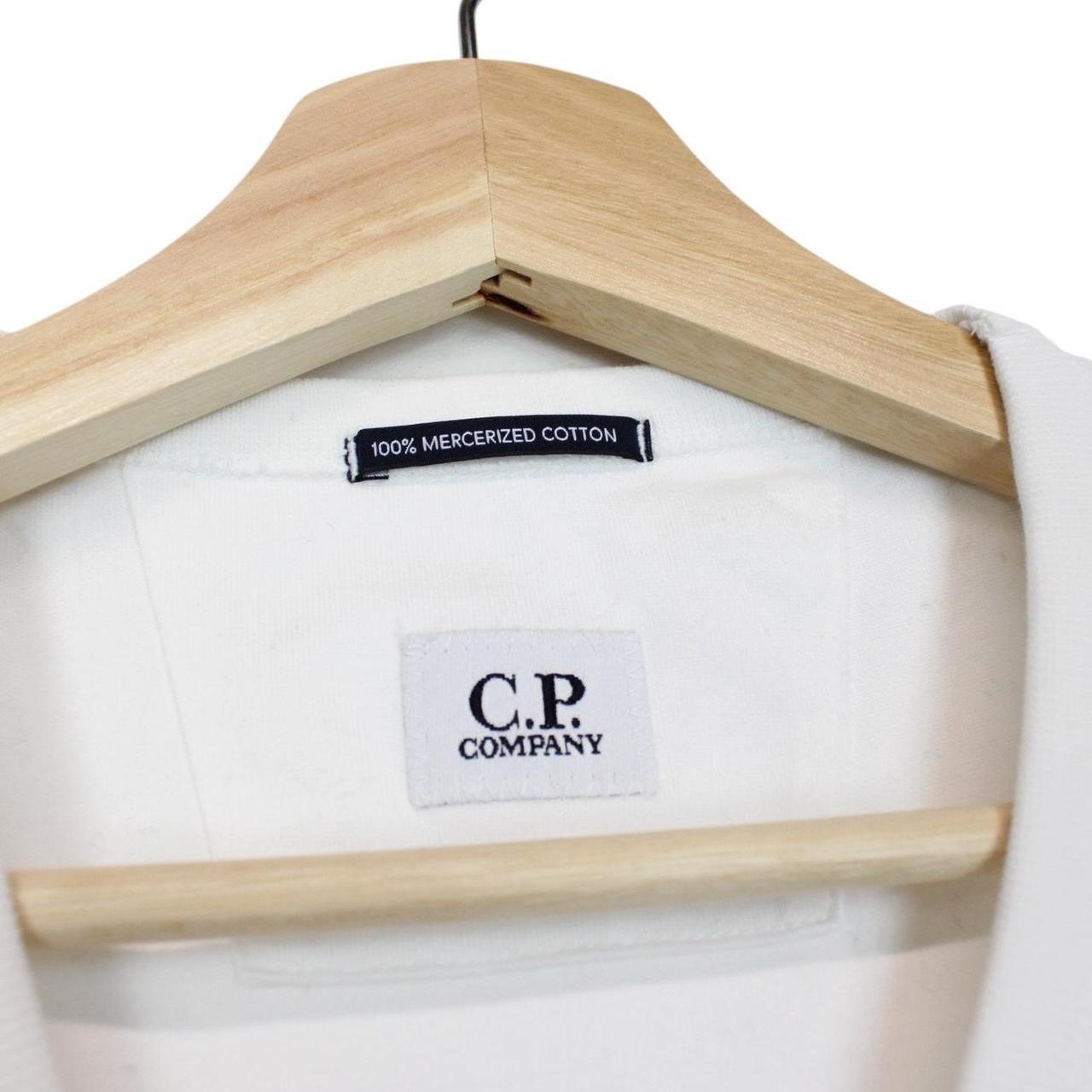 CP Company white pocket t-shirt with embroidered logo and mercerized cotton fabric.