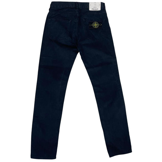 Stone Island black slim fit cotton trousers with iconic compass logo patch.