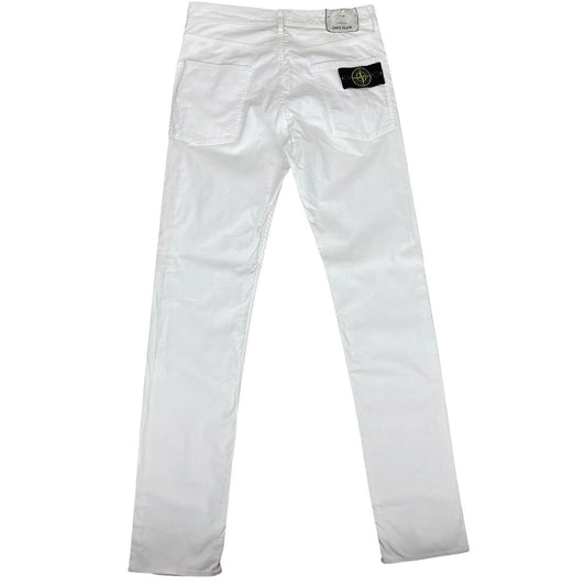 Stone Island white slim fit cotton trousers with logo patch and front mark.