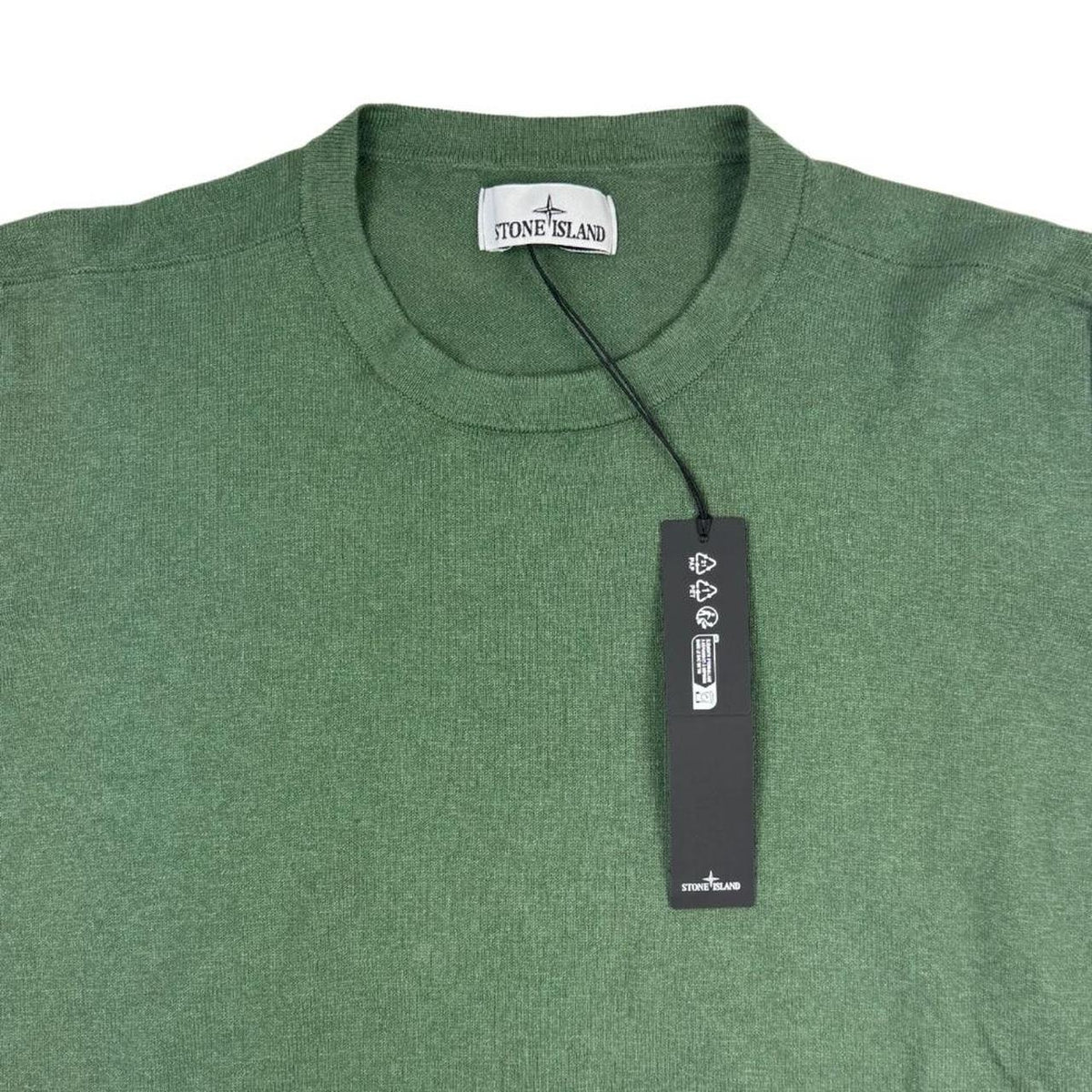Stone Island green knit jumper made of organic cotton with logo patch.