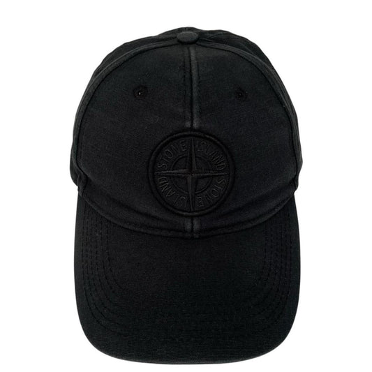 Stone Island black baseball cap with embroidered compass logo and cotton material.