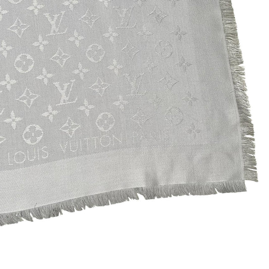 Louis Vuitton grey shawl scarf with LV monogram pattern in silk and wool blend.