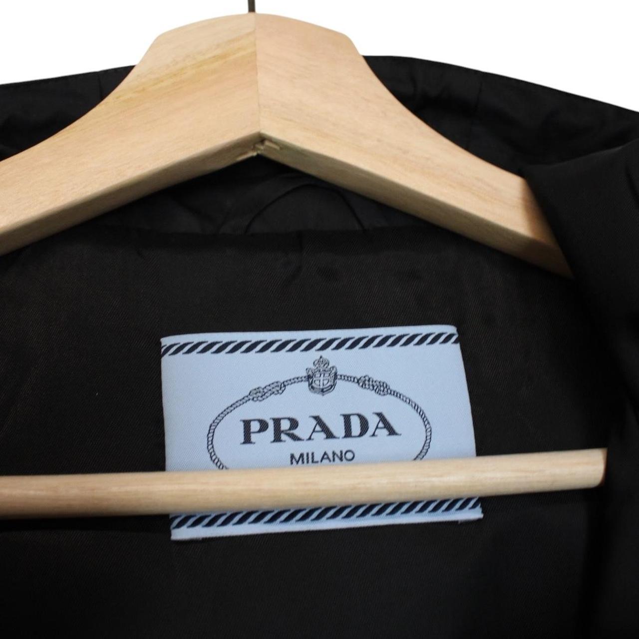Prada black hooded jacket with full zip, Re-Nylon material, logo detail on sleeve.