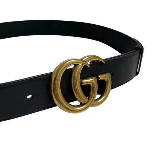 Gucci black leather Marmont belt with antique gold double G logo buckle.
