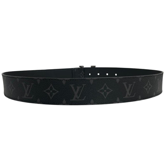 Louis Vuitton black canvas belt with LV monogram pattern and gold-tone buckle.