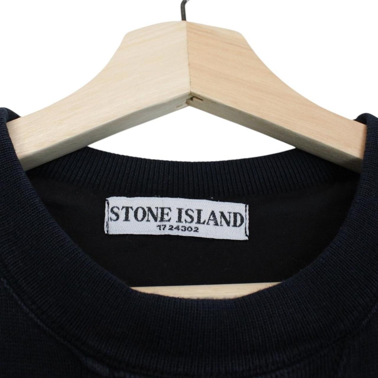 Stone Island navy blue cotton sweatshirt with logo patch and ribbed cuffs.