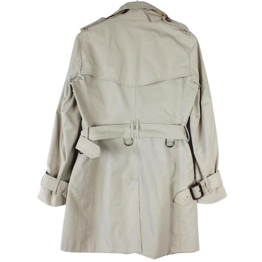 Burberry beige trench coat featuring Nova Check pattern and double-breasted design with belt.