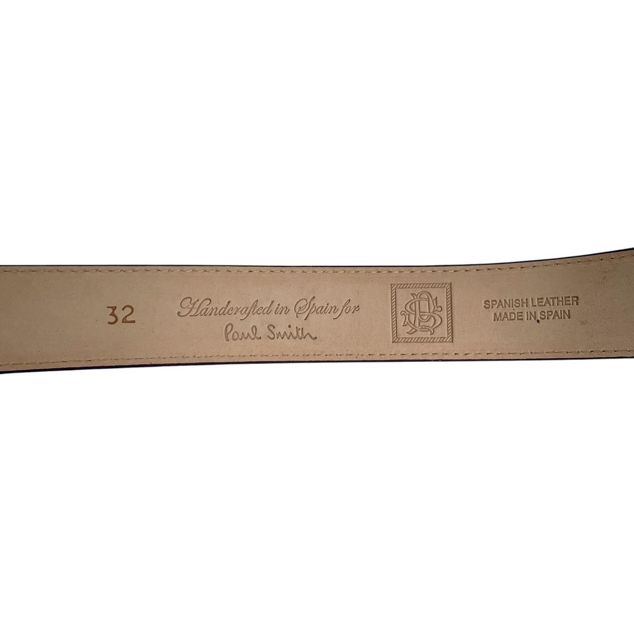 Paul Smith purple leather belt handcrafted in Spain with subtle storage marks.