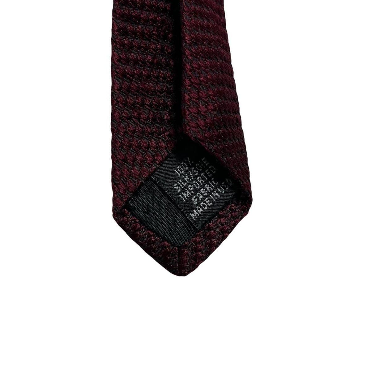DKNY burgundy silk tie with subtle sheen and classic design.