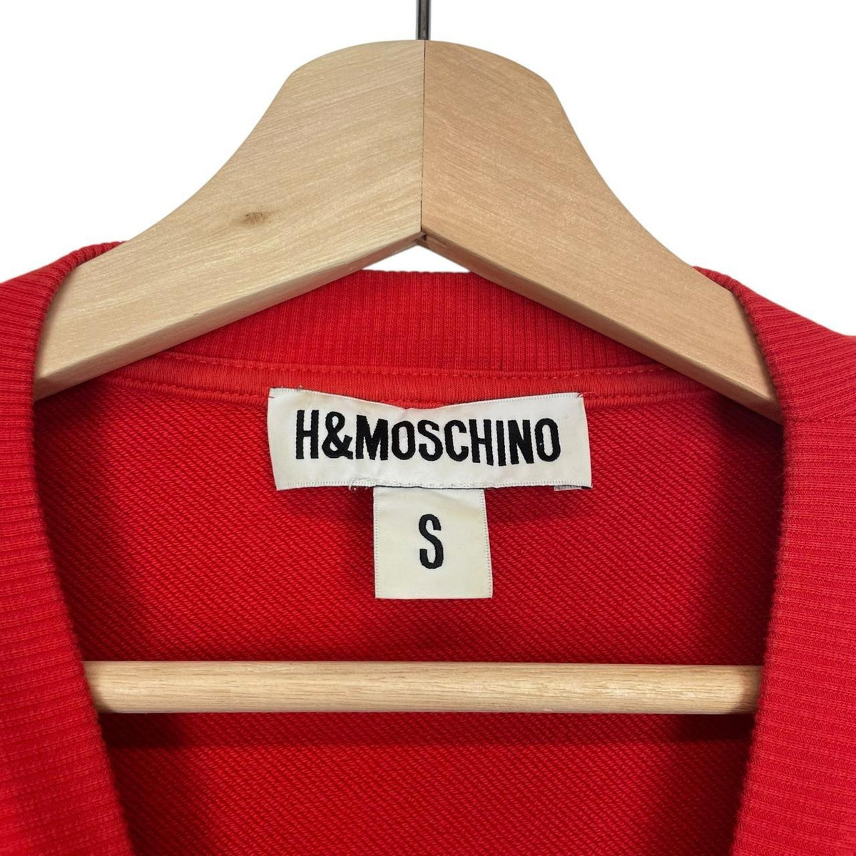Moschino red cotton sweatshirt featuring Disney graphic print and logo details.