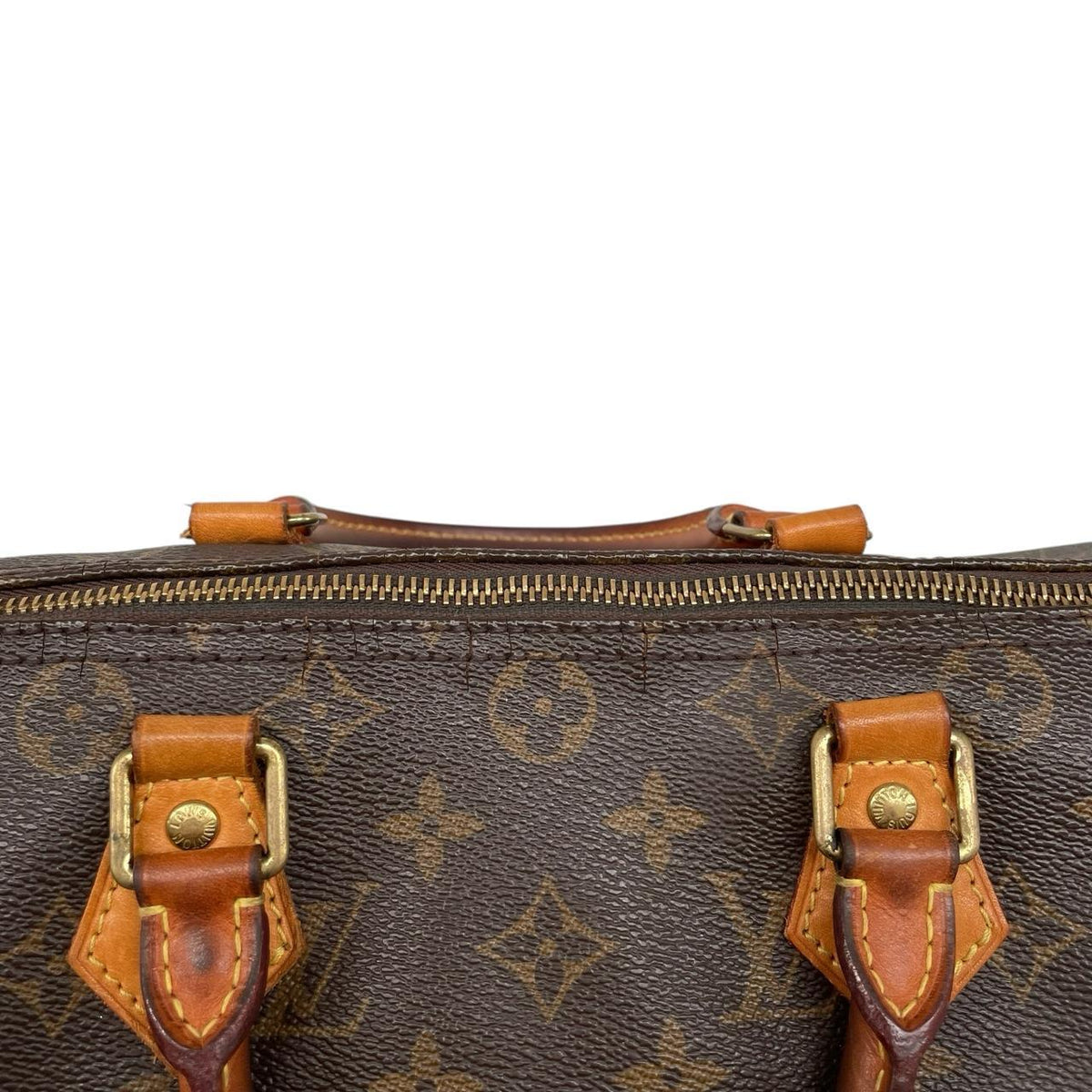 Louis Vuitton beige and brown monogram coated canvas shopping tote with padlock detail.