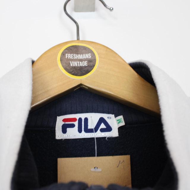 Vintage 90s Fila White and Black 1/4 Zip Spellout Fleece Jumper