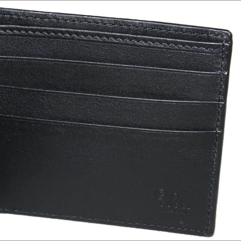Gucci Leather Microguccisima Monogram Wallet