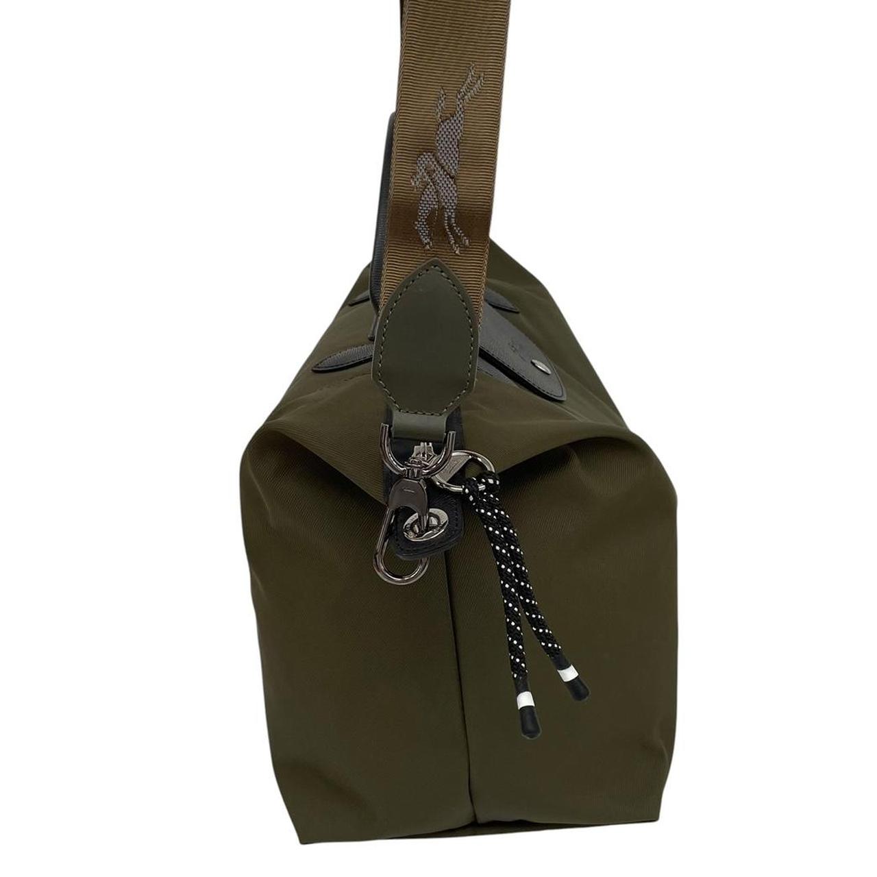 Longchamp green Le Pliage Enery tote bag with logo and durable nylon material.