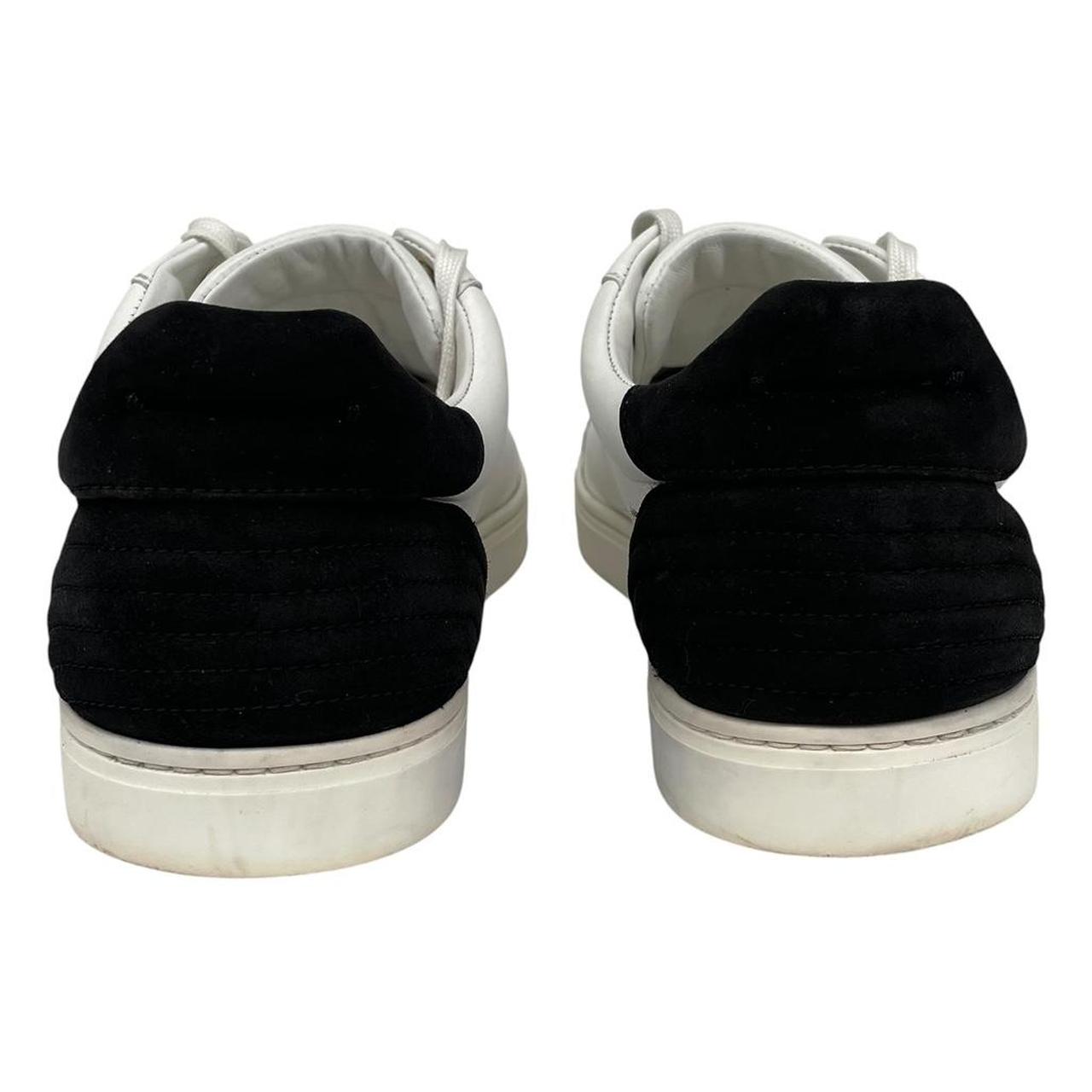 Dolce & Gabbana white and navy blue leather trainers with logo detailing and creased toe box.