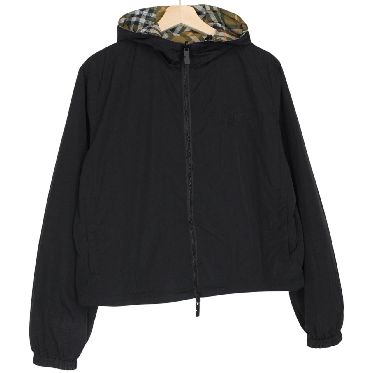 Burberry reversible nylon jacket in brown and black Nova Check pattern with logo.