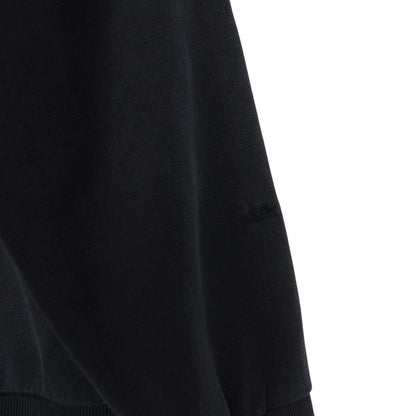 Stone Island navy blue cotton sweatshirt with logo patch and small sleeve repair.